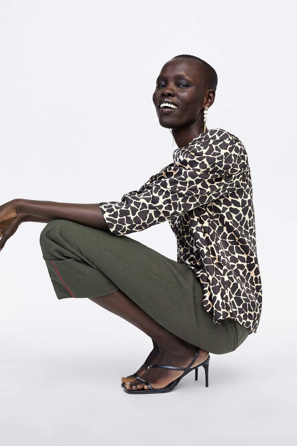 DRAPED ANIMAL PRINT BLOUSE