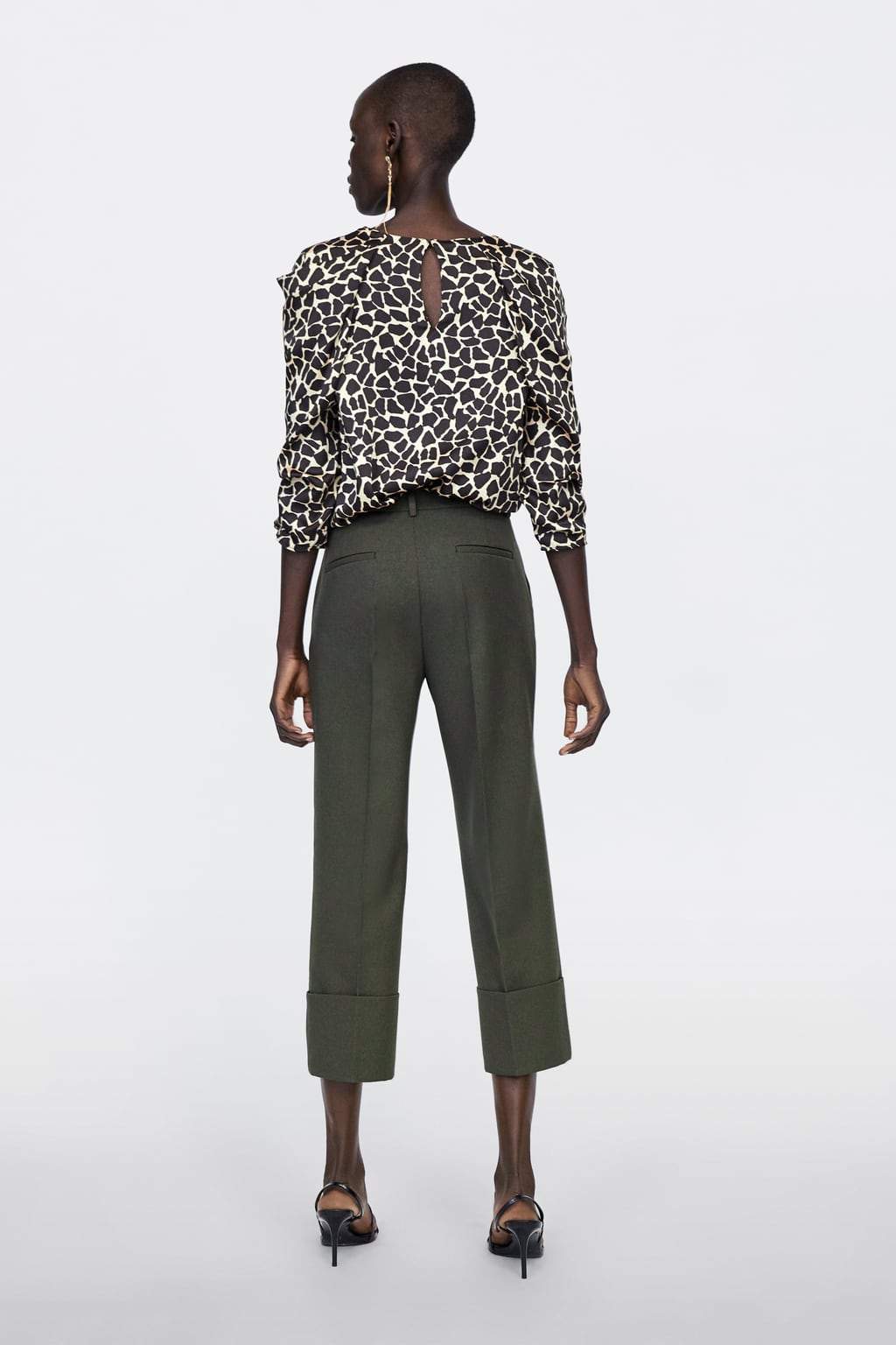 DRAPED ANIMAL PRINT BLOUSE