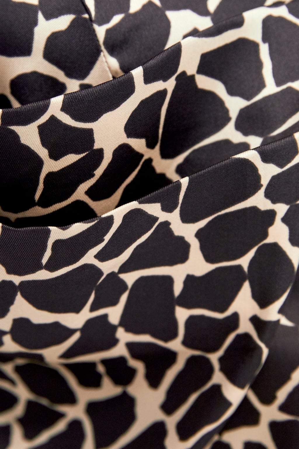 DRAPED ANIMAL PRINT BLOUSE