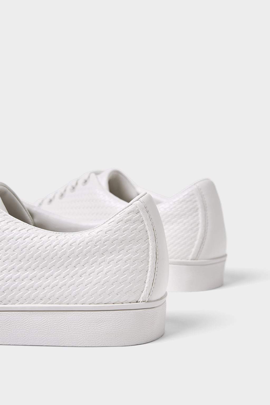 EMBOSSED SNEAKERS