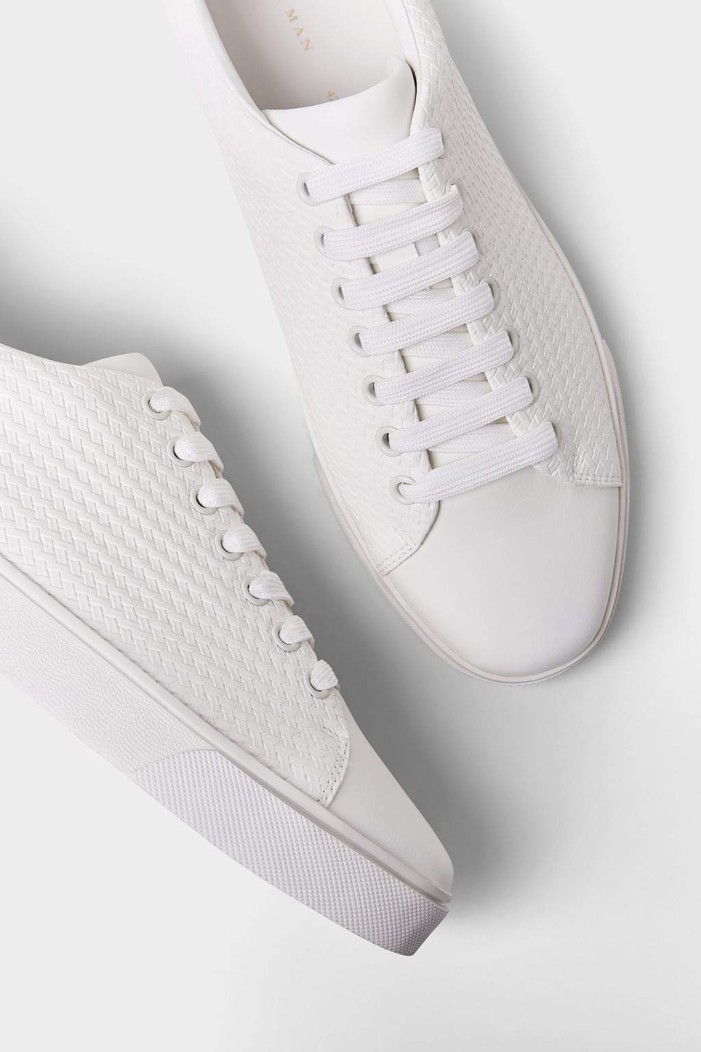 EMBOSSED SNEAKERS